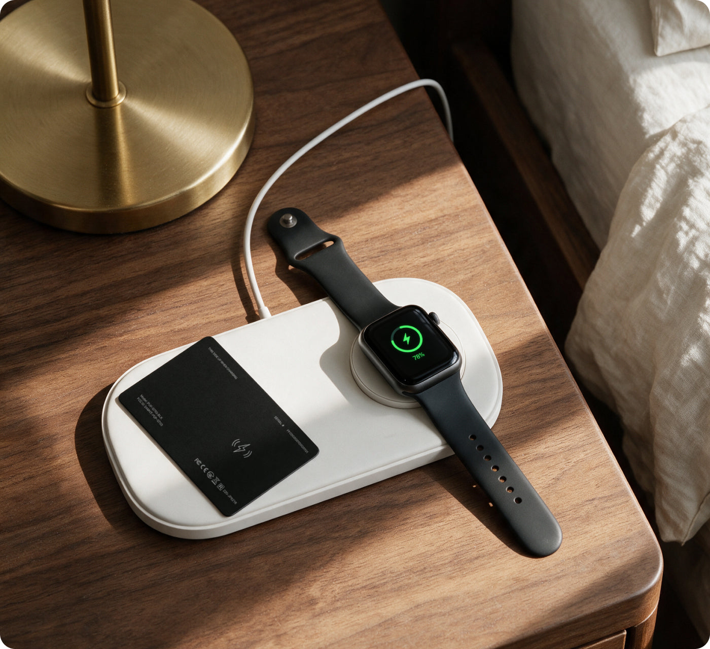 SmartCard Black charging on a Qi wireless pad